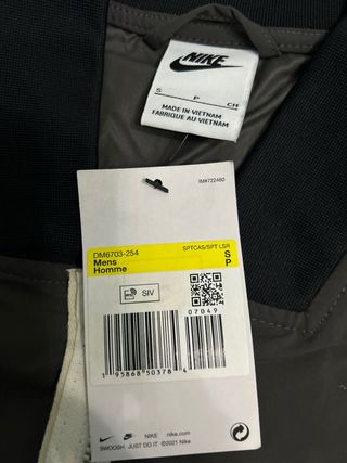 Chaqueta cortavientos Nike gris