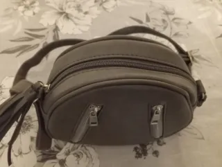 Borsa tonda da donna grigia