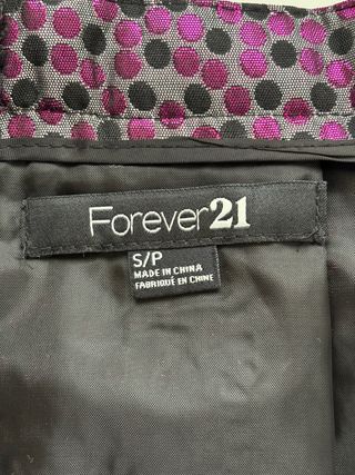 Minifalda plisada fucsia y negro