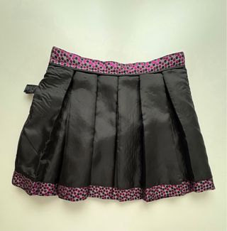 Minifalda plisada fucsia y negro