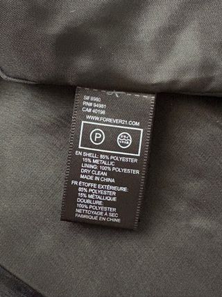 Minifalda plisada fucsia y negro