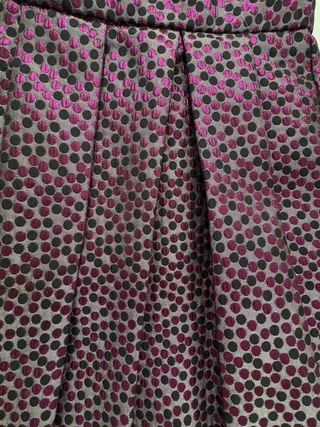 Minifalda plisada fucsia y negro