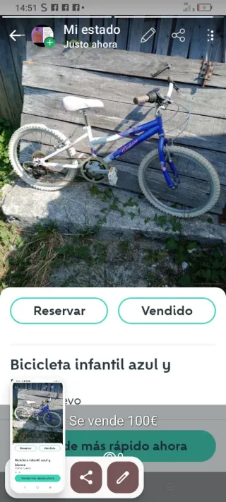 Bicicleta infantil azul y blanca