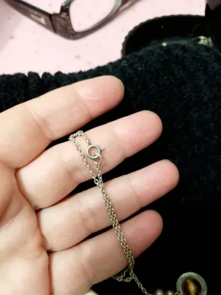 Collana in materiale nobile beige e argento