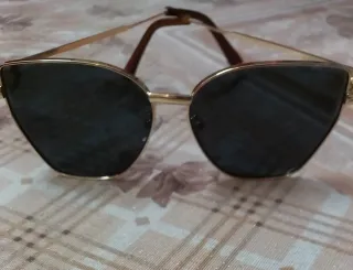 Occhiali da sole donna oro e neri