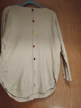 Jersey beige con bolsillos