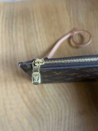 Pochette Louis Vuitton Marrón