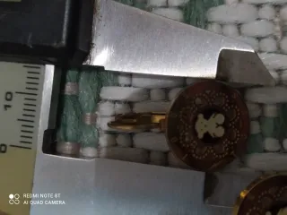 Pendientes Tous dorados con detalle blanco