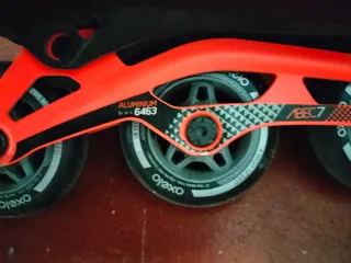 Patines en línea Oxelo negros y naranjas