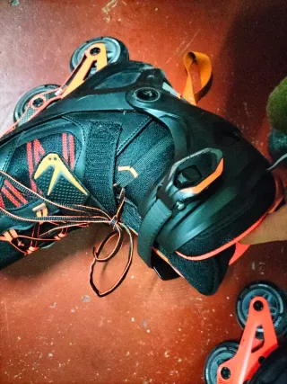 Patines en línea Oxelo negros y naranjas