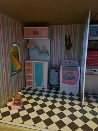 Casa de muñecas de madera