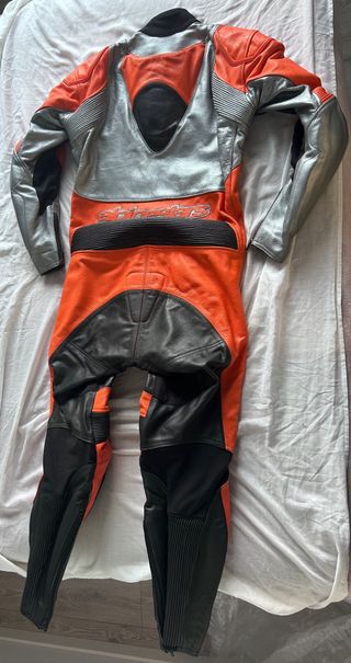 Mono Alpinestars naranja, gris y negro