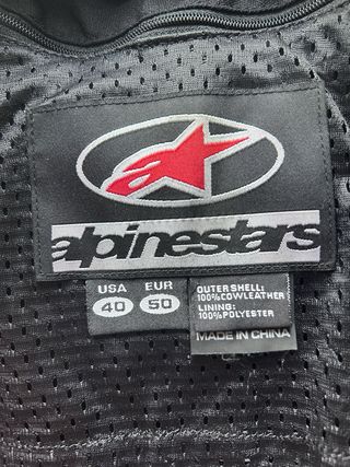 Mono Alpinestars naranja, gris y negro