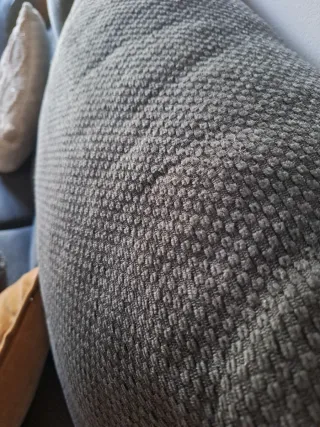 Sofá modular gris oscuro con reposacabezas