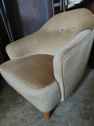 Descalzadora de tela beige con flecos