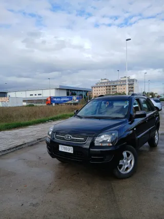 KLMS SOLO((125,800))KIA SPORTAGE GASOLINA