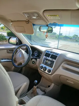 KLMS SOLO((125,800))KIA SPORTAGE GASOLINA