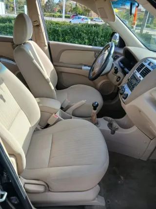 KLMS SOLO((125,800))KIA SPORTAGE GASOLINA