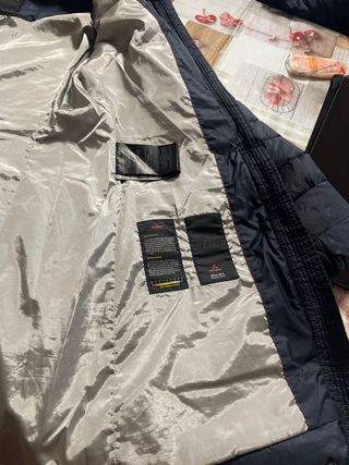 Piumino blu con cappuccio