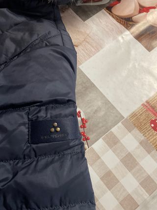 Piumino blu con cappuccio