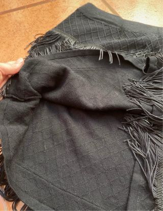 Falda negra con flecos