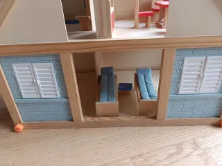 Casa de muñecas de madera