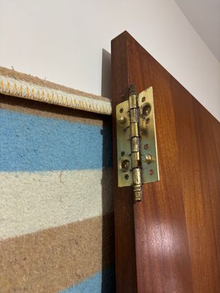 Puerta de entrada de madera