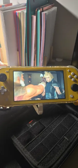 Nintendo Switch Lite Amarilla + extras