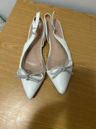 Bailarinas blancas con lazo brillante