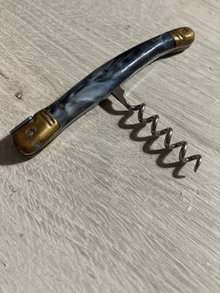 Tira-tappi vintage in metallo e corno