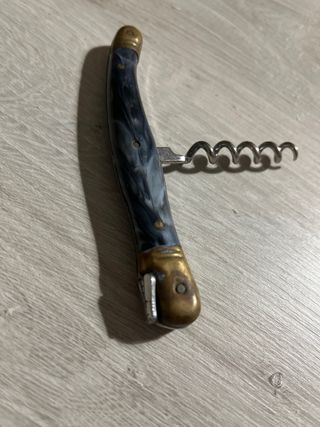 Tira-tappi vintage in metallo e corno