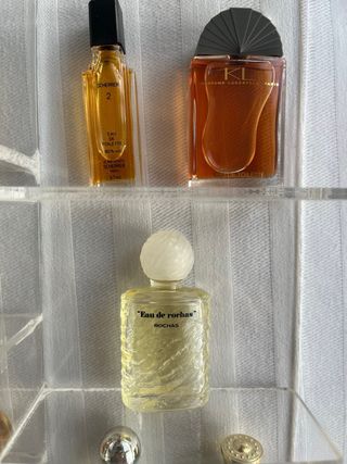 Espositore con 20 mini profumi originali