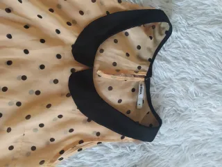 Blusa juvenil lunares beige y negro