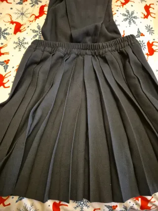 Peto falda pañal negro con tirantes dorados