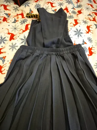 Peto falda pañal negro con tirantes dorados