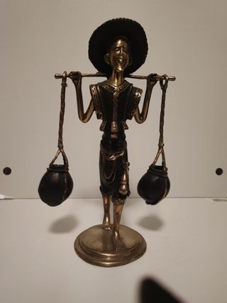 Escultura de bronce aguador