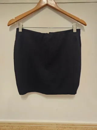 Falda negra tubo cremallera dorada Talla L