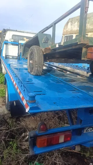 Grúa plataforma portacoche Ford transit