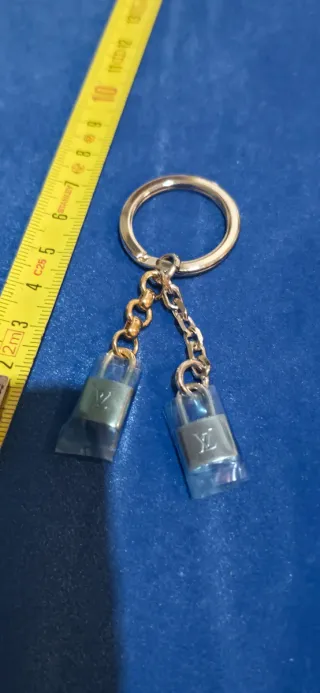 Llavero Louis Vuitton Candado Doble Dorado y plate
