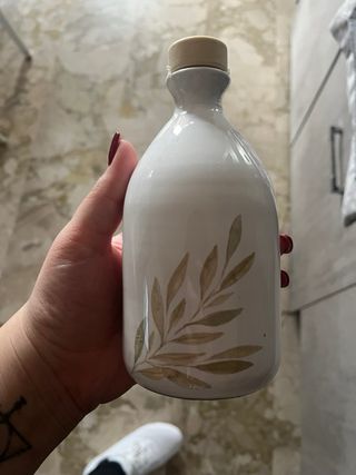 Bottiglia in ceramica decorata