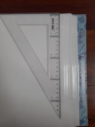 Álbum de fotos con diseño floral y mariposas