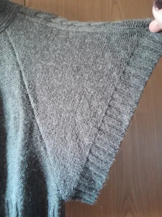 Smanicato lana collo alto bottoni