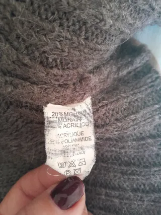 Smanicato lana collo alto bottoni