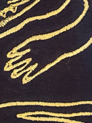 Camiseta negra cocodrilo bordado