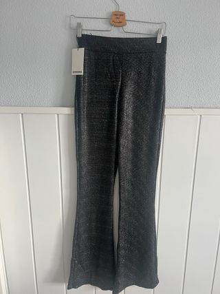 Pantalón flare Bershka brillos