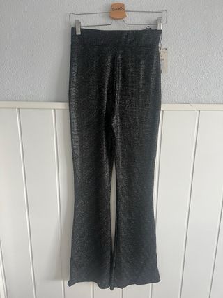 Pantalón flare Bershka brillos
