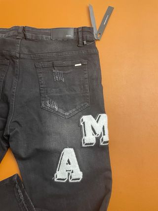 Jeans Amiri neri strappati