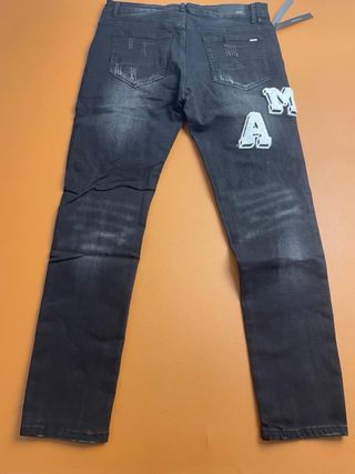 Jeans Amiri neri strappati