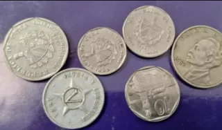 Lote 100 monedas de varios países. LEE