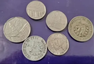 Lote 100 monedas de varios países. LEE